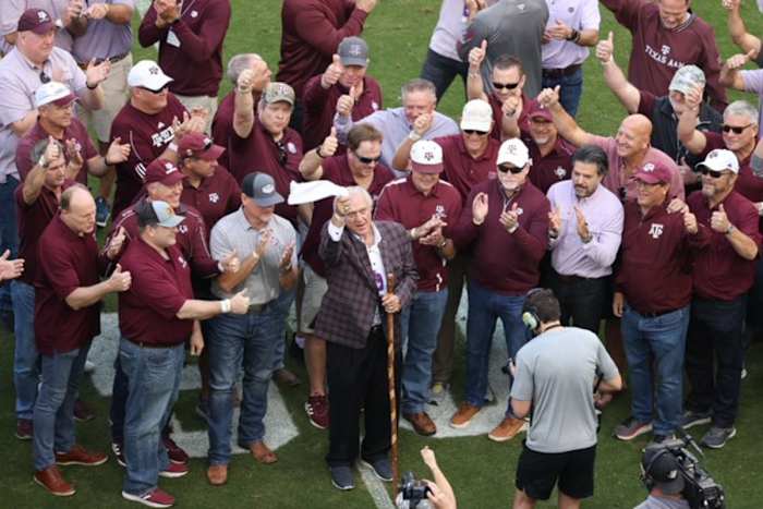 Texas A&M Aggies head coach Jackie Sherrill and the 1983 "12th Man Kickoff" team honored at halftime at Kyle Field